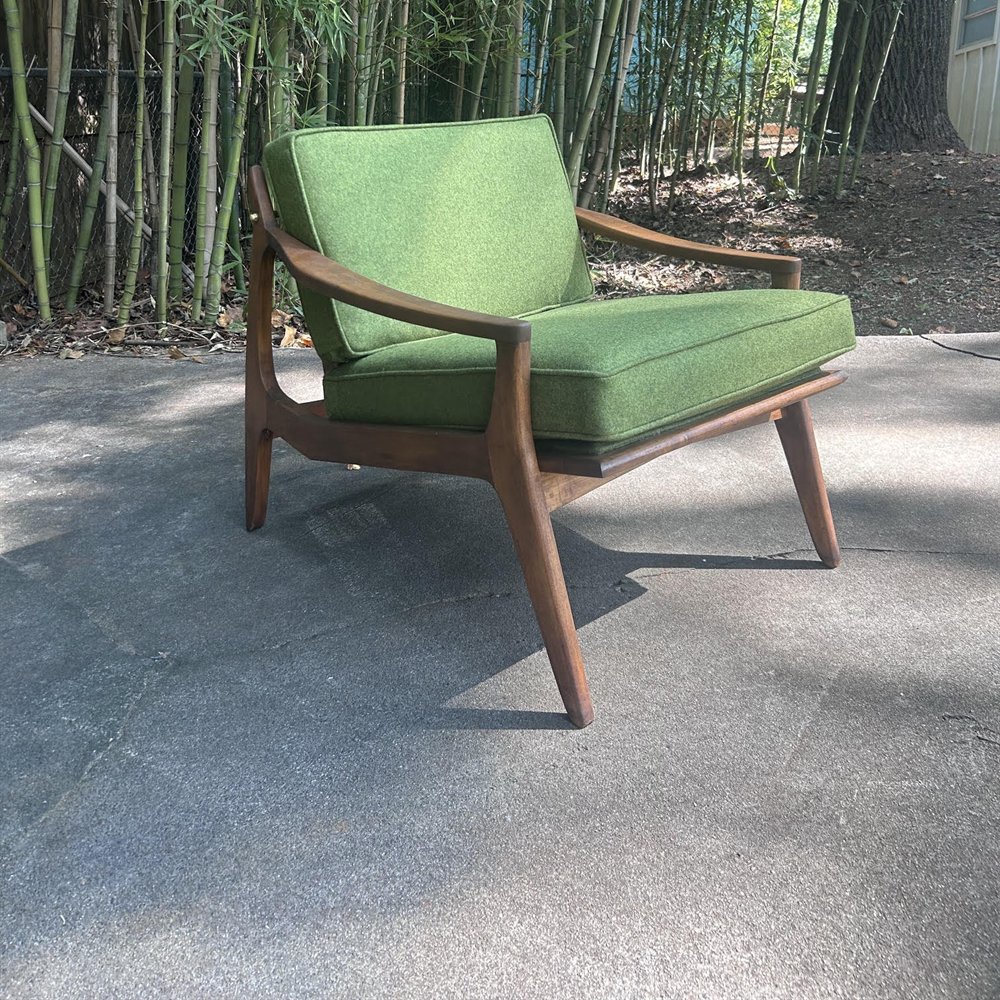 The same chair refinished with green wool cushions