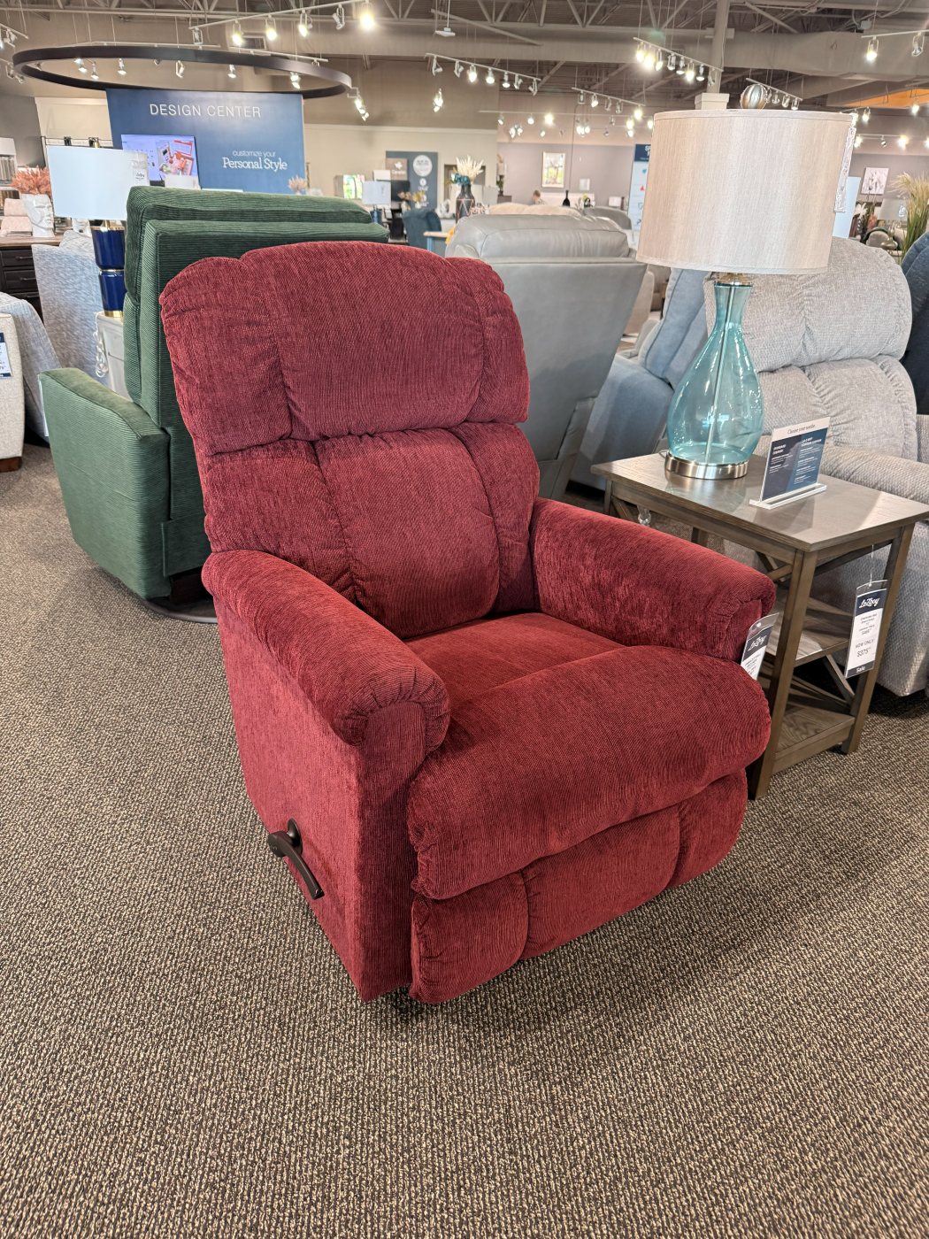 Oxblood burgundy recliner on the floor